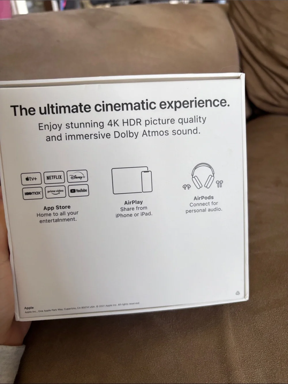Apple TV with Silver Remote and Black Streaming Box
